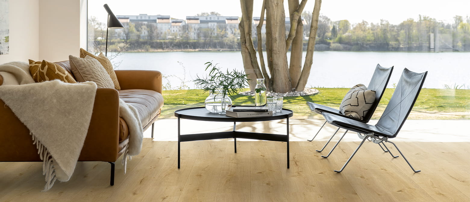 living room with beige laminate floor and view on nature